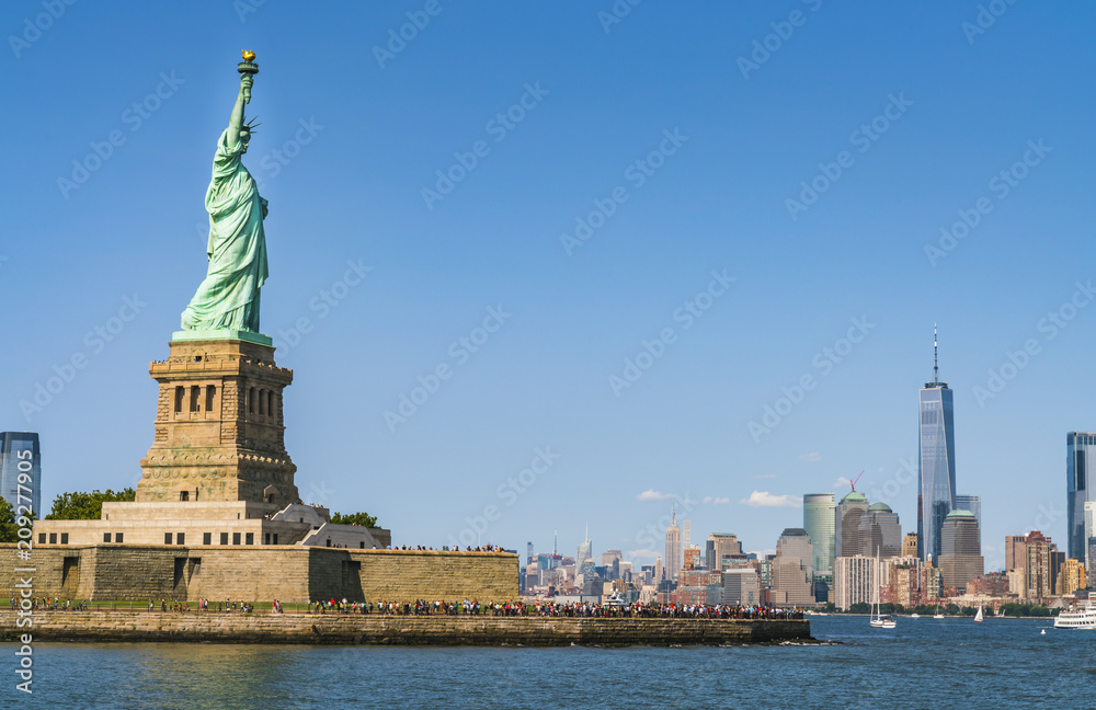 The statue of Liberty  with blue sky background.