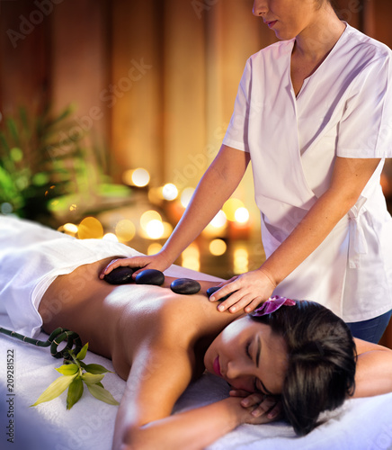 Spa Treatment - Masseur With Hot Stones