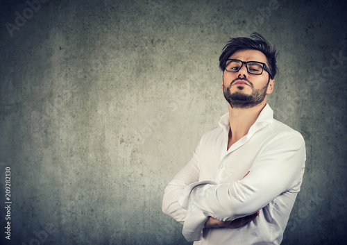 Overconfident stylish man in glasses photo