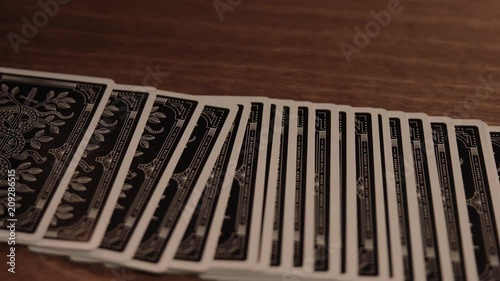 Playing Cards on Wooden Surface