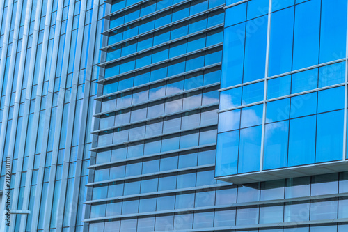 Urban abstract - windowed corner of office building.