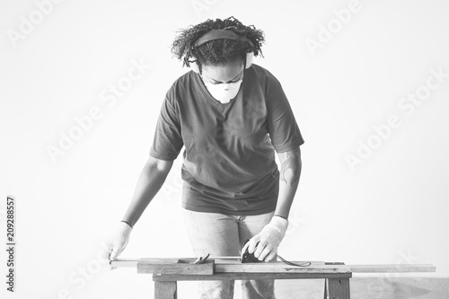 African american woman renovating the house