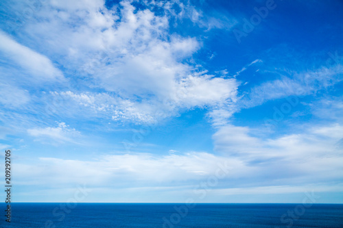 Blue sky with clouds © Mervin