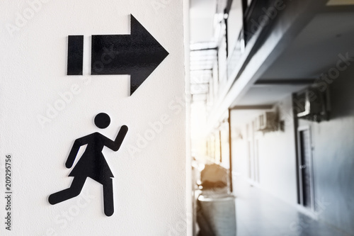 Sign of woman toilet on white cement wall background.