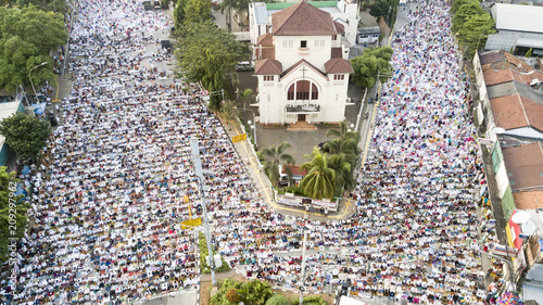 Thousands of muslims praying together on the street during Eid-ul Fitr day