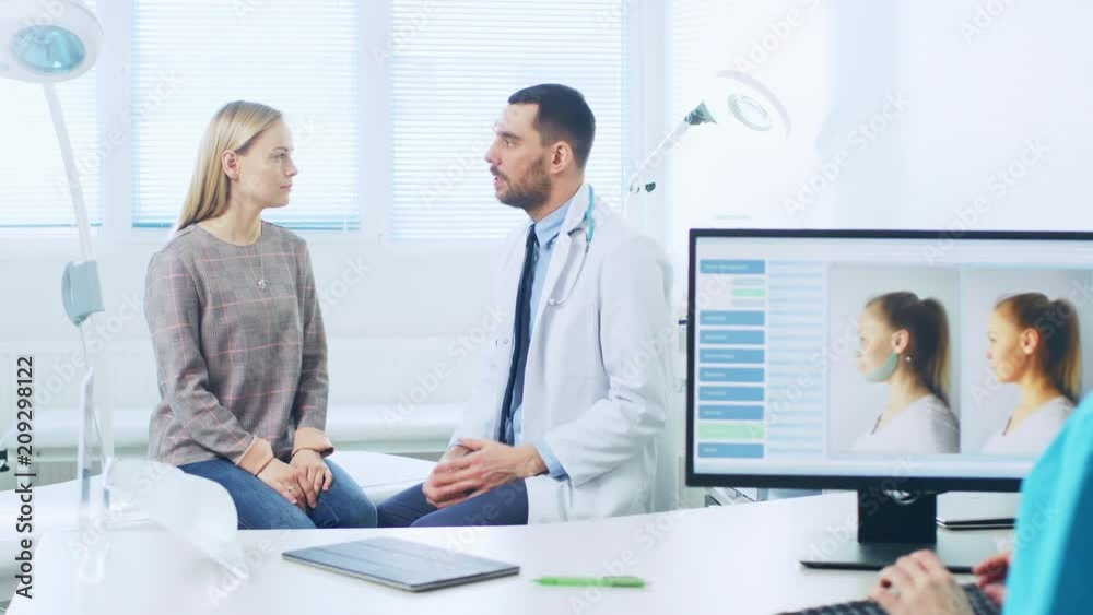 Plastic / Cosmetic Surgeon Consults Woman about Facelift Surgery. Nurse Works on Computer that Shows Types of Facelift Procedures Available. Shot on RED EPIC-W 8K Helium Cinema Camera. Plastic / Cosmetic Surgeon Consults Woman about Facelift Surgery. Nurse Works on Computer that Shows Types of Facelift Procedures Available. Shot on RED EPIC-W 8K Helium Cinema Camera.