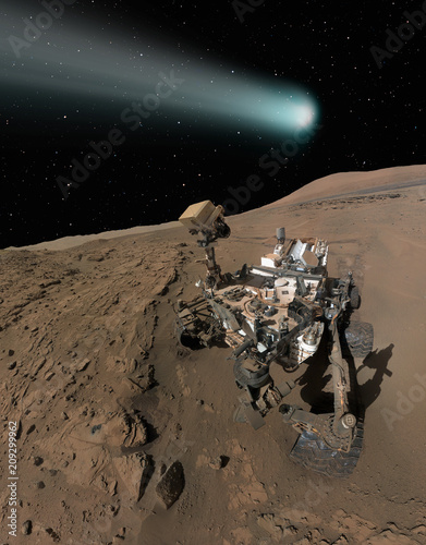 Fototapeta Naklejka Na Ścianę i Meble -  Comet C/2013 A1 over the Martian landscape