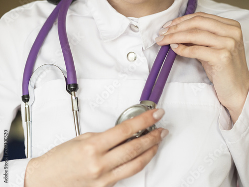 Female hand holding stethoscope. health care concept. © Stavros