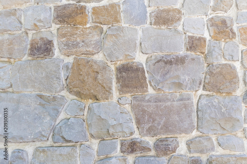 Wall from different stones  background  texture