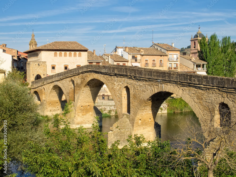 The 11th century Romanesque bridge over the Arga River is one of the emblems of the Way of Saint James - Puente La Reina, Navarre, Spain