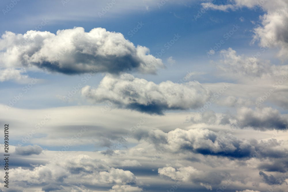 Dark clouds in a blue sky Dark clouds in a blue sky