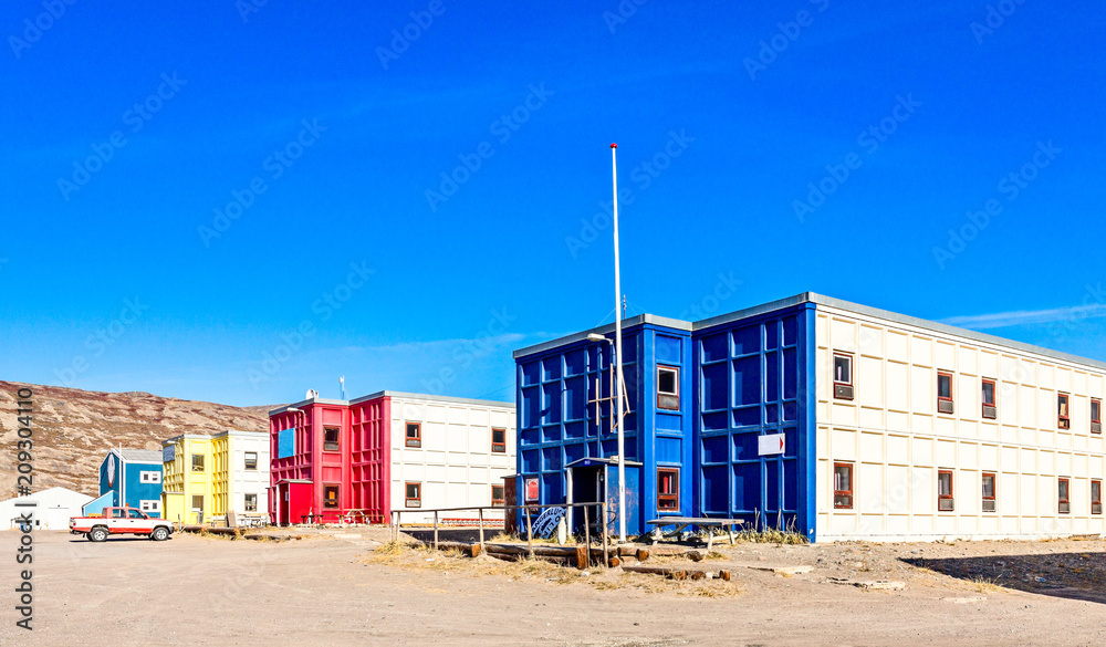 Typical arctic street with block of living houses in tundra, Kan