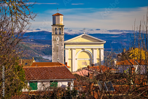 Town of Vizinada church and skyline above istrian landscape view photo