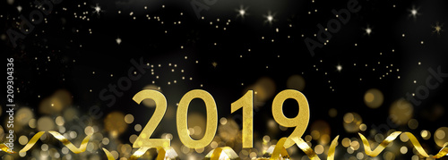 golden 2019 in ribbon and on abstract night background 