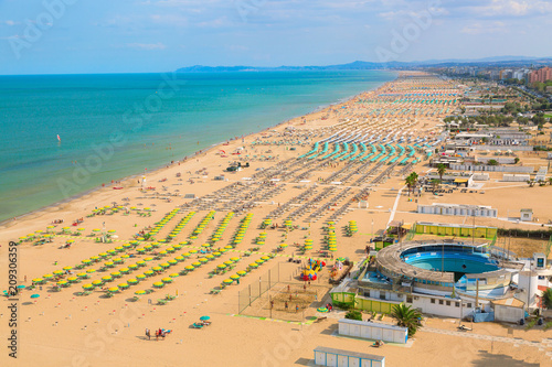 Aerial view of Rimini beach with people and blue water. Summer vacation concept. photo