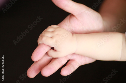 father and son, hand in hand