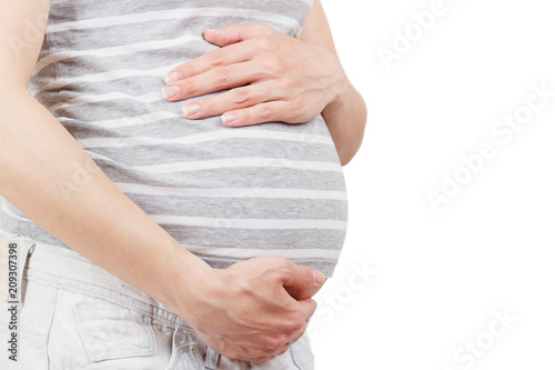 Wallpaper Mural Pregnant woman holds her hands on the belly Torontodigital.ca