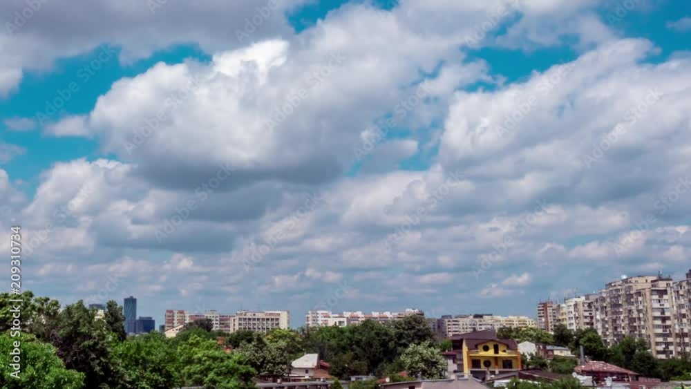Timelapse moving clouds over apartment building in the city. Fast moving clouds. Dolly footage Timelapse moving clouds over apartment building in the city. Fast moving clouds. Dolly footage
