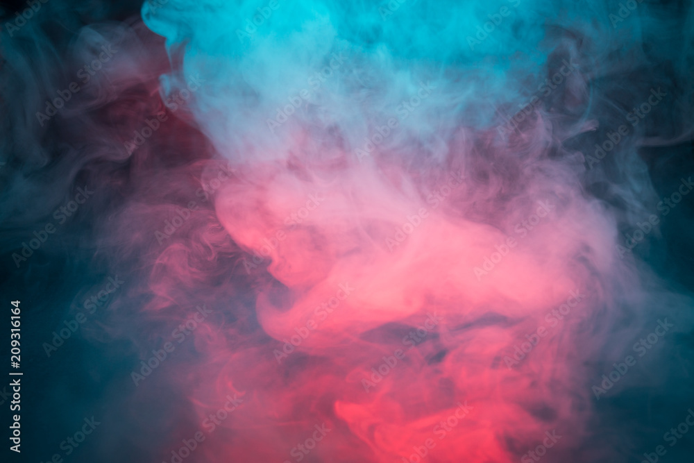 Colorful smoke on a black background closeup