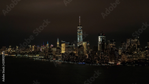 AERIAL: Iconic skyscrapers in downtown Manhattan financial district skyline © helivideo