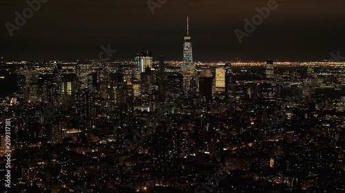 AERIAL City lights in Midtown Manhattan and Downtown financial district at night