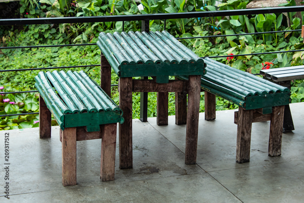Old table and Chair made from bamboo. in the aisles Old table and Chair made from bamboo. in the aisles