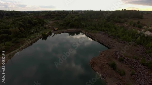 Beautiful view from a road going through the beautiful lake and forest