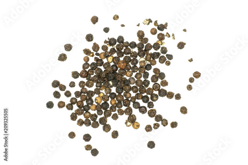 Black pepper grains stack top view isolated on white background.