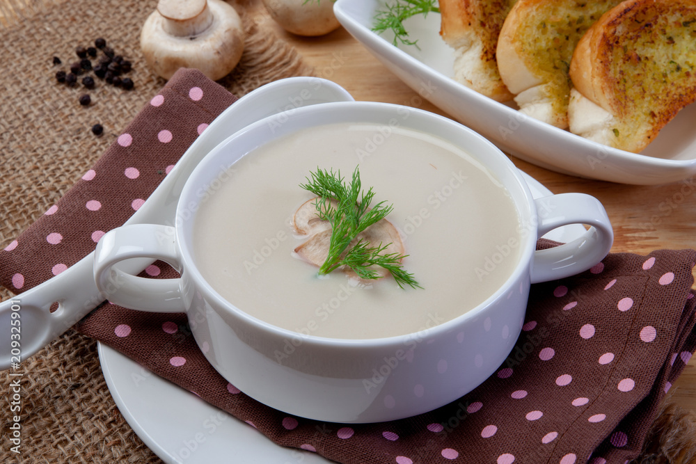 Mushroom cream soup on a table, food Mushroom cream soup on a table, food