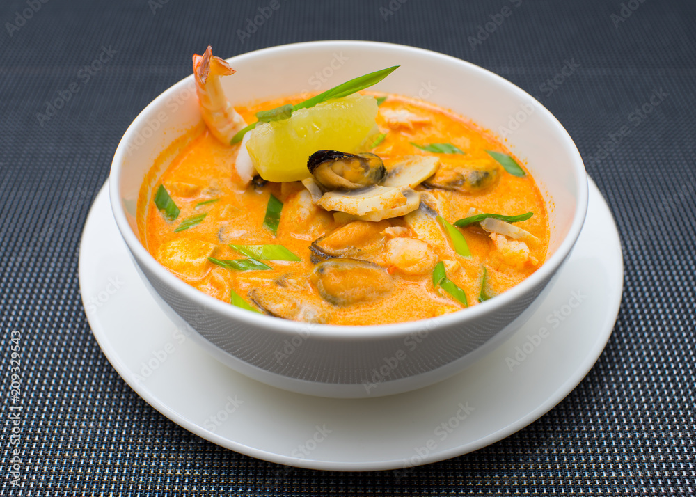 Seafood soup on the table. Shrimp, mussel, tomatoes. Seafood soup on the table. Shrimp, mussel, tomatoes.