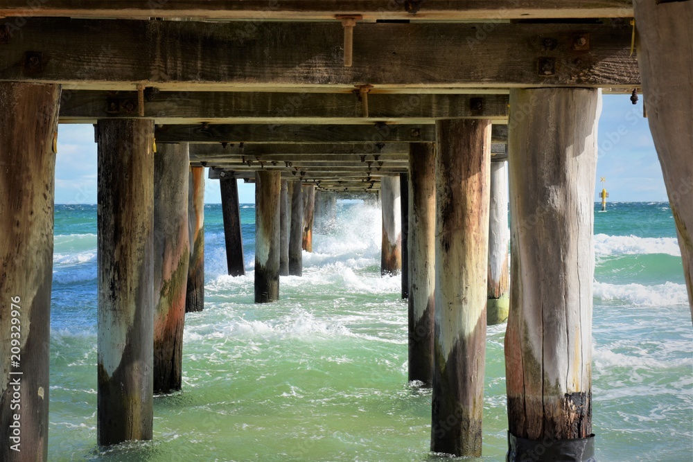 Waves under the bridge. Seaford pier.Australia Waves under the bridge. Seaford pier.Australia