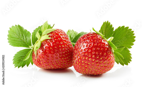 fresh red strawberries with green leaves