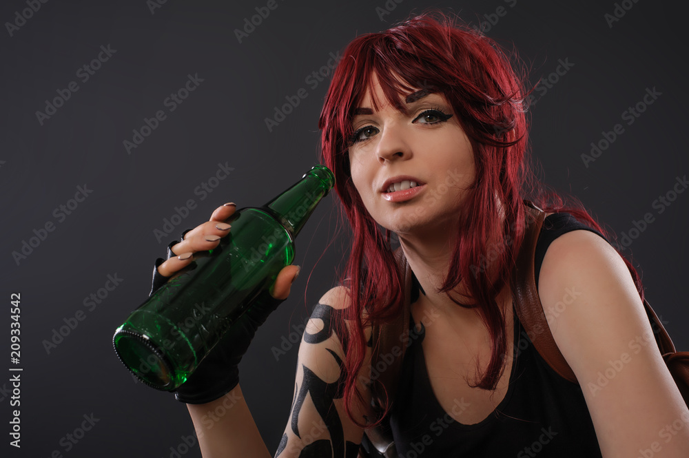 Photo of sexy young woman drinking beer from bottle Stock Photo | Adobe  Stock