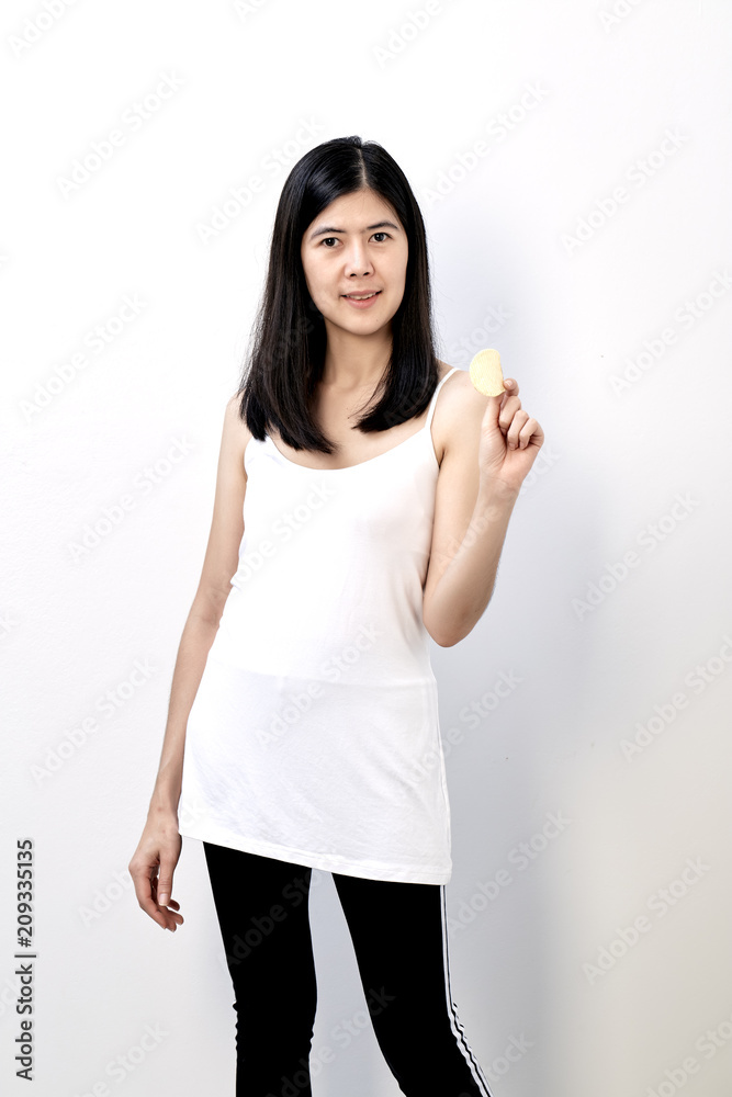 woman holding a potato chips woman holding a potato chips