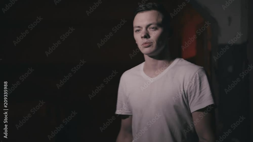 Young man hides and escapes from his pursuers