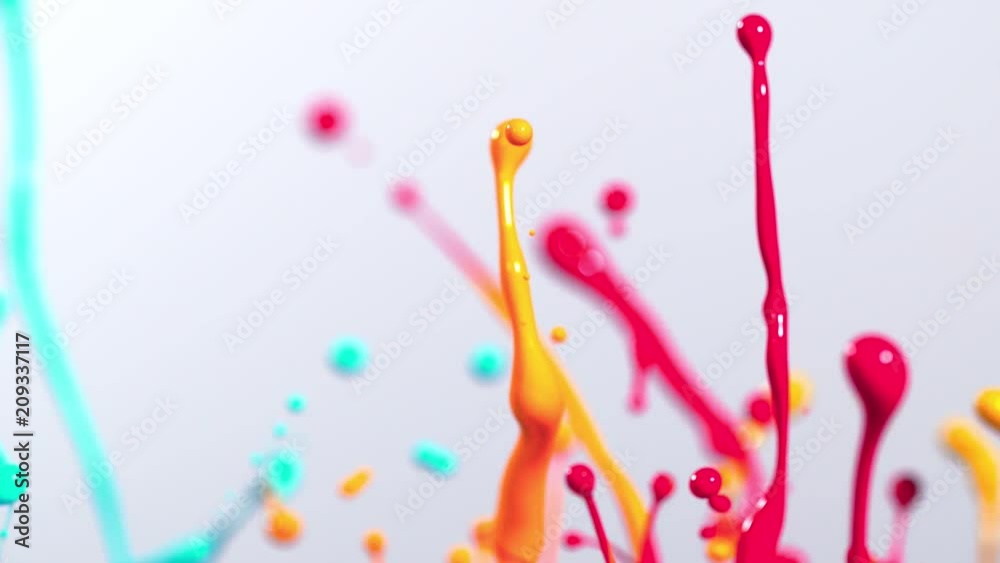 Colorful splashing paint in super slow motion. Shot with high speed cinema camera, 2000fps