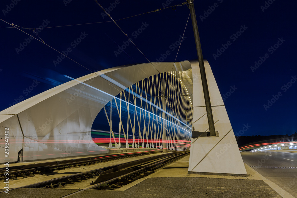 Obraz premium Troja bridge in Prague. New and modern Troja bridge over Vltava river in Holesovice, Prague, Czech Republic. Night cityscape
