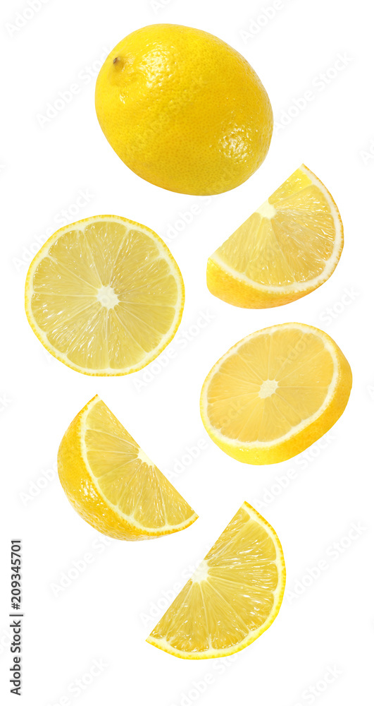 falling, hanging, flying whole and half piece of lemon fruits isolated on white background with clipping path