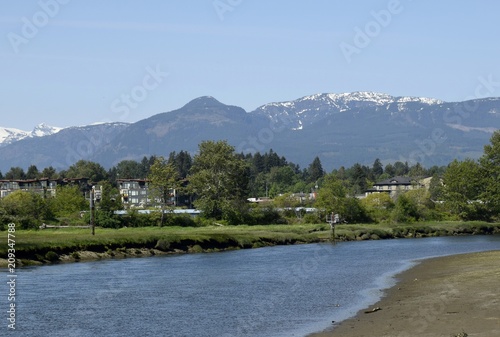 View across the Courtenay river towards the Strathcona mountain range, Vancouver Island BC Canada photo