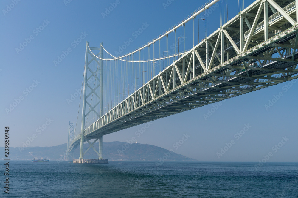 Akashi Kaikyo bridge, the world longest suspension metal bridge in Kobe, Japan Akashi Kaikyo bridge, the world longest suspension metal bridge in Kobe, Japan