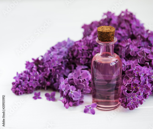 Essential oil with lilac flowers