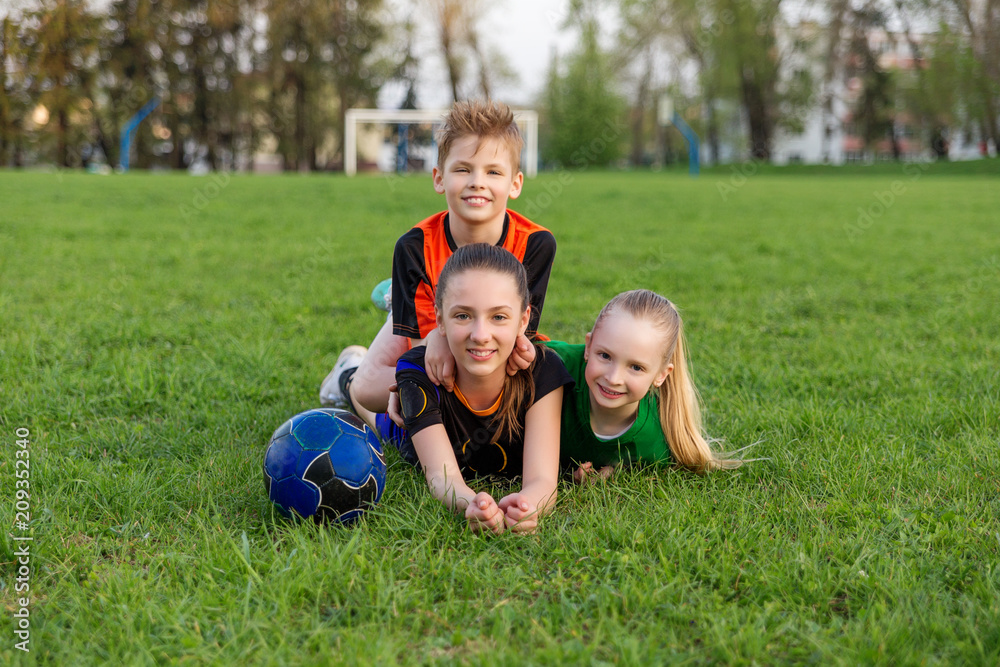 Family playing football on the field. Family football Family playing football on the field. Family football