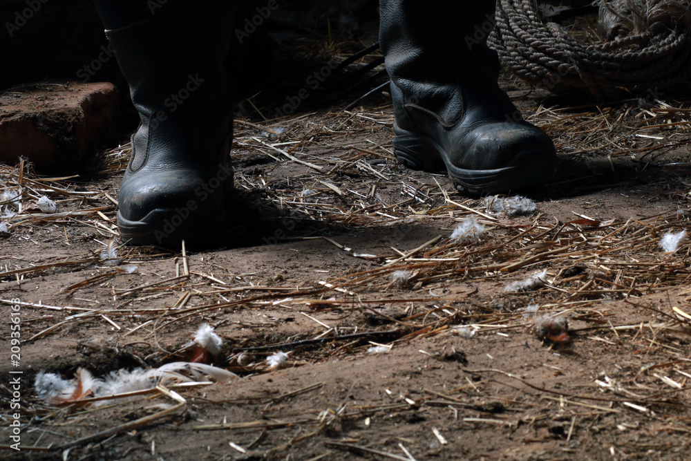 The maniac in black boots in the shed. The maniac in black boots in the shed.