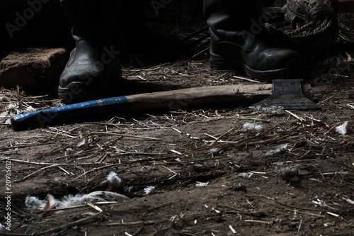 The maniac in black boots in the shed.