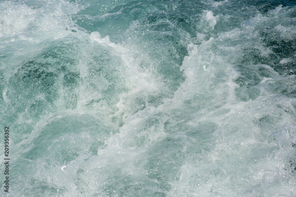 Sea waves splashing, yacht track