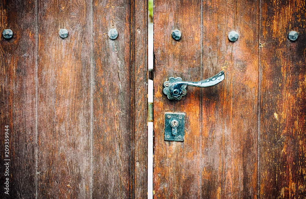 Wooden gate with door knob and keyhole. Wooden gate with door knob and keyhole.