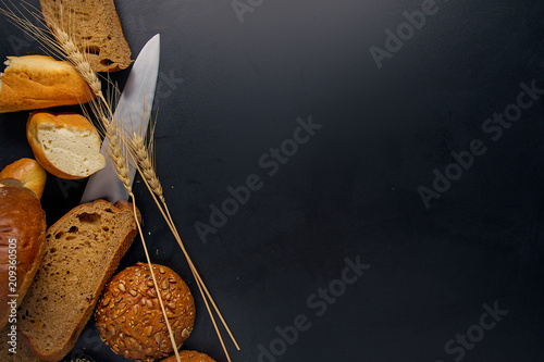 a piece of cereal still life black background table