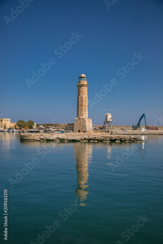harbor and lighthouse of the city of rethymno in in crete greece  photo