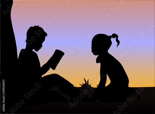 Silhouette of boy and girl reading books under the tree at sunset