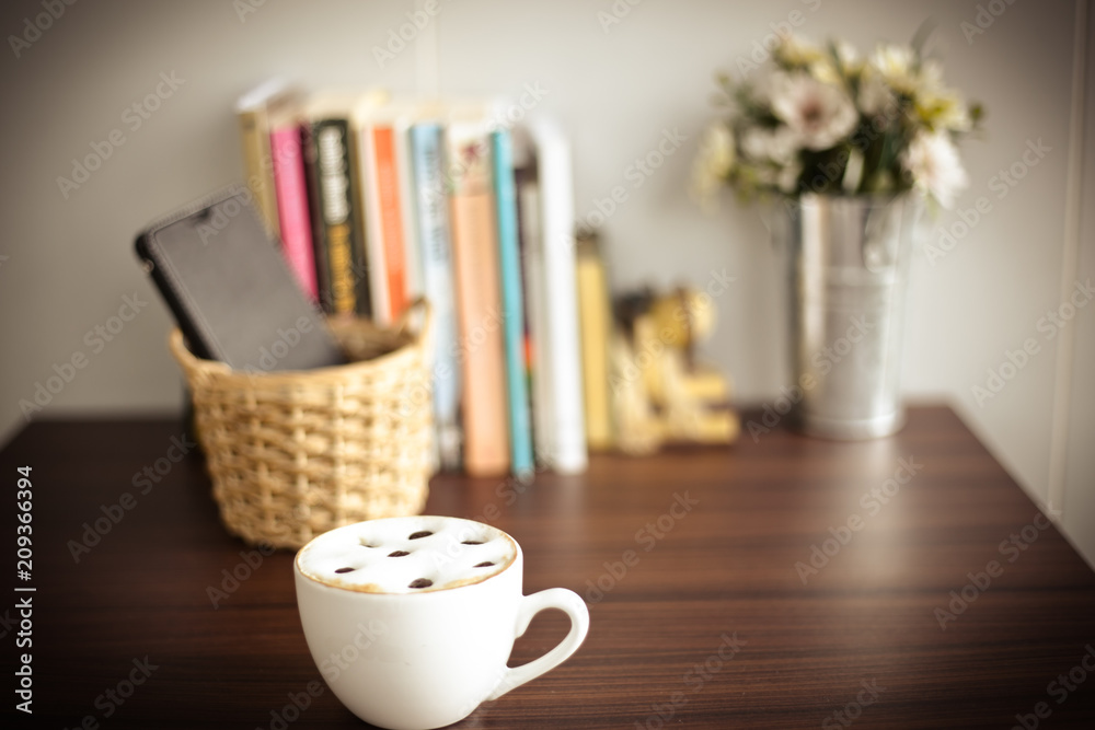Hot coffee on wooden table with smart phone and pen. Hot coffee on wooden table with smart phone and pen.